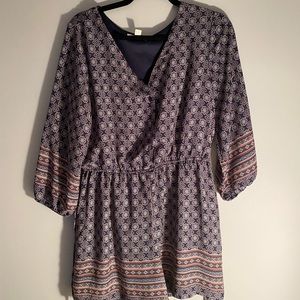 Very cute and flattering romper with boho pattern size large